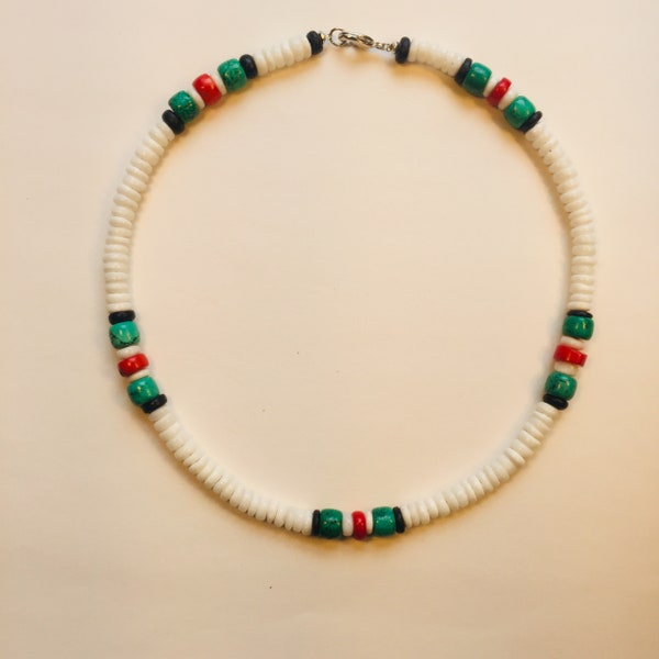 Summer wind. Fresh necklace made of shell slices, horn, red coral and green Howlith pearls
