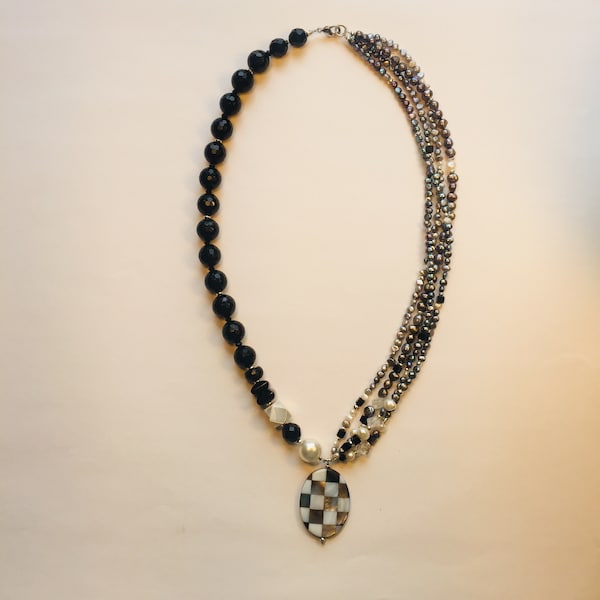 Grandezza in grey and black. Asymmetrical necklace for individualists. Onyx and freshwater pearls