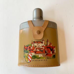 Vintage German Flask with Leather Case Featuring Scene of Nurnberg