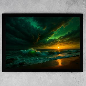 May include: Framed print depicting a dramatic sunset over the sea. The sky is a mix of dark green and orange clouds, with the sun low on the horizon. Waves crash on the shore, reflecting the golden light of the setting sun.