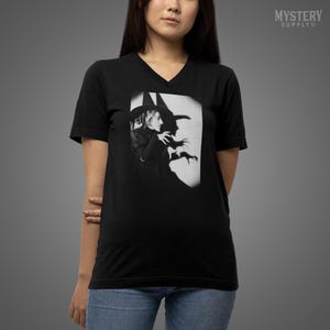 Wicked Witch of the West 1930s vintage profile with shadow Margaret Hamilton Wizard of Oz Halloween Horror Mens Womens Unisex V-Neck T-Shirt from Mystery Supply Co. @mysterysupplyco