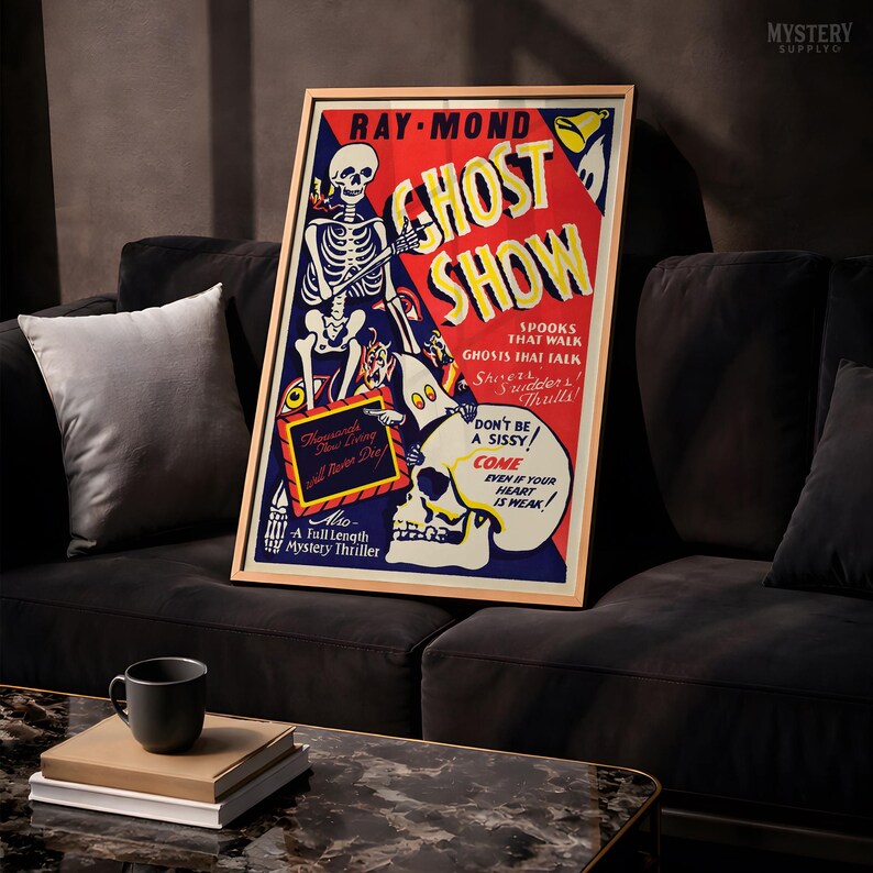 May include: A framed vintage-style poster titled RAY-MOND GHOST SHOW featuring a skeleton, a ghost, and a large skull. The red, blue, and yellow graphic includes text such as SPOOKS THAT WALK, GHOSTS THAT TALK, and DON'T BE A SISSY, COME EVEN IF YOUR HEART IS WEAK.