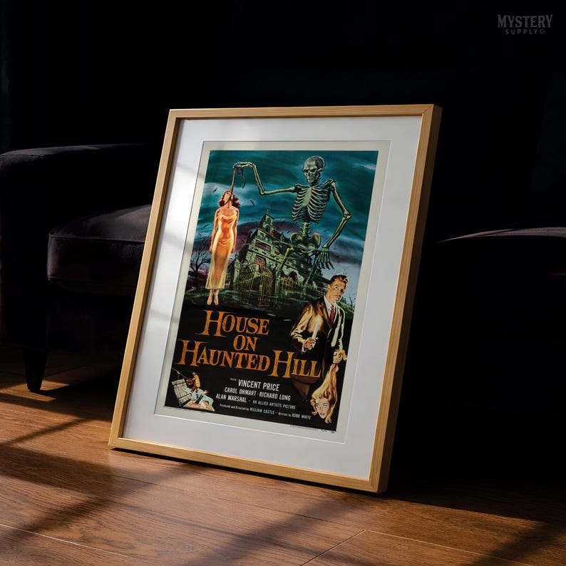 May include: A framed movie poster for House on Haunted Hill featuring a skeleton looming over a house, a woman in a yellow dress, and a man in a suit. The text reads House on Haunted Hill, Vincent Price, Carol Ohmart, Richard Long, Alan Marshal.