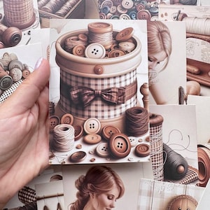 May include: A rectangular card featuring a central illustration of a round container filled with sewing supplies, including various brown and white buttons and spools of thread. The container is decorated with a brown and white chequered pattern and a bow.