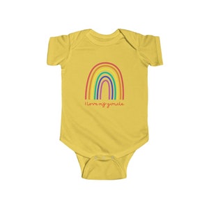 May include: Yellow baby onesie with a rainbow graphic and the text "I love my gurkle" in red.