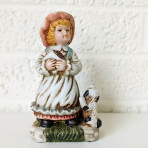Vintage Figurine of a Girl and a Dog