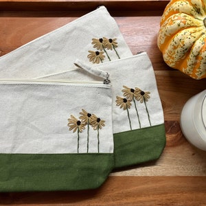 Large two-toned hand embroidered sunflower canvas travel bag | cosmetic bag | everyday clutch