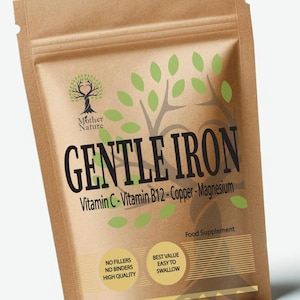May include: A brown paper pouch with the words "GENTLE IRON" in large black letters. The pouch also features the text "Vitamin C - Vitamin B12 - Copper - Magnesium" and the words "Food Supplement". The pouch has a tree logo and the words "Mother Nature".