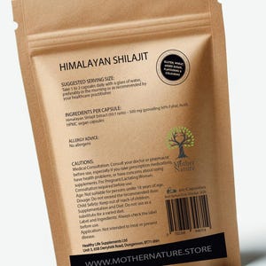 May include: A brown paper bag with a white label that says "Himalayan Shilajit" and lists the ingredients, serving size, and cautions. The bag also has a black and white barcode and a "Mother Nature" logo.