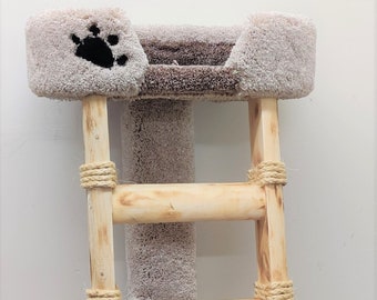 May include: A wooden cat tree with a ladder and a platform covered in brown and gray carpet. The ladder has three steps and is secured with rope. The platform has a paw print design.
