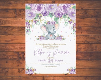 May include: A baby shower invitation featuring a watercolor illustration of a gray elephant with a floral crown. The invitation has purple floral accents and gold text that reads "Baby Shower" and the names "Khloe y Damian".
