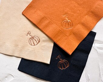 Foil Pressed Pumpkin Cocktail Napkins in black, tan, and orange