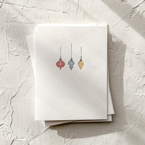Adornos vintage: tarjeta navideña con tipografía minimalista