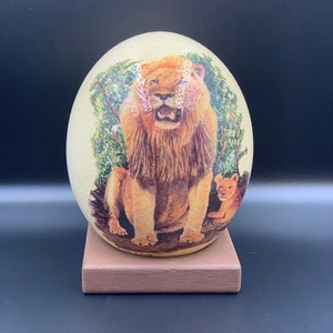Vintage Lion and Cub Hand Painted Ostrich Egg with wooden stand highly collectible
