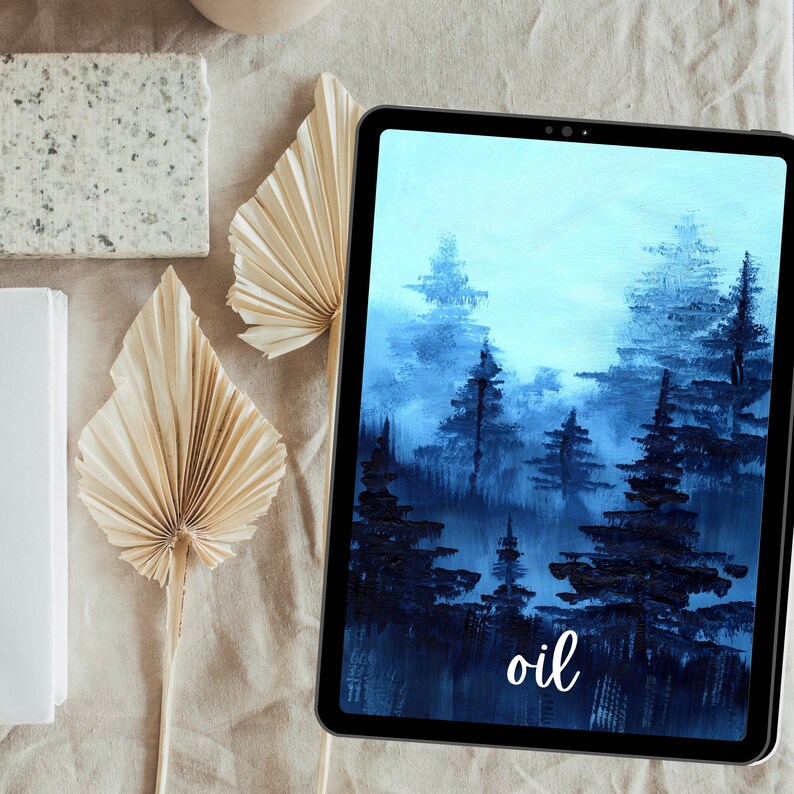 May include: A digital painting of a blue and white forest scene with the word "oil" written in white at the bottom. The painting is displayed on a tablet.