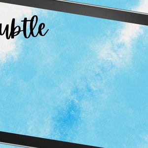 May include: A digital tablet with a black frame and a blue watercolor background. The word "subtle" is written in black cursive at the top of the screen.