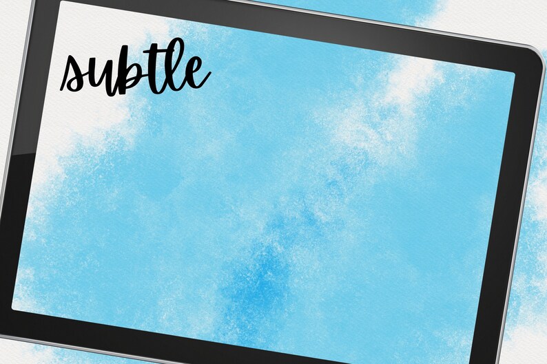 May include: A digital tablet with a black frame and a blue watercolor background. The word "subtle" is written in black cursive at the top of the screen.