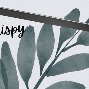 May include: A digital tablet screen displaying a watercolor illustration of a leafy branch with the word "crispy" written in black cursive.