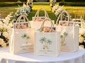 Canvas Bag with Green Palm Tree Design, Personalized Wedding Tote, Bridal Party Gift Bag, Wedding Welcome Bag, Destination Bridesmaid Favor product logo