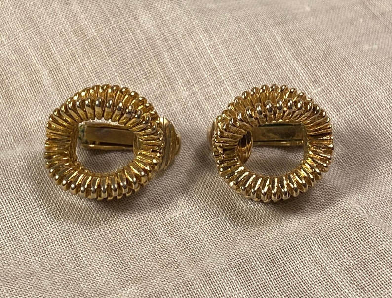 Signed Avon Goldtone Round Serrated Edge Clip Earrings