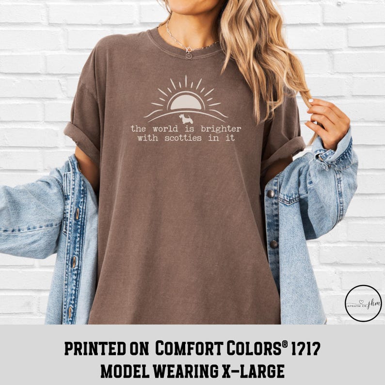 May include: Brown t-shirt with the text "the world is brighter with scotties in it" and a graphic of a sun and a dog. The shirt is a Comfort Colors 1212 model, size X-Large.