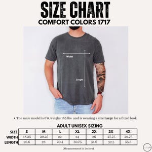 May include: Size chart for Comfort Colors 1717 t-shirts. The chart includes adult unisex sizing from S to 4X, with width and length measurements in inches. The model is 6'0, weighs 185 lbs, and wears a Large for a fitted look. The text "SIZE CHART" is at the top.