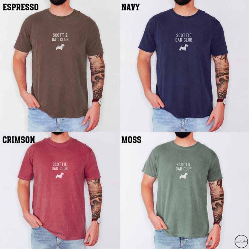 May include: Four t-shirts in different colors: espresso, navy, crimson, and moss. Each shirt has the text "SCOTTIE DAD CLUB" and a small white dog graphic. The shirts are short-sleeved and appear to be made of a soft material.