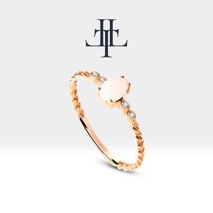 14K Gold Pear Opal Ring with Diamond: Twisted Shank