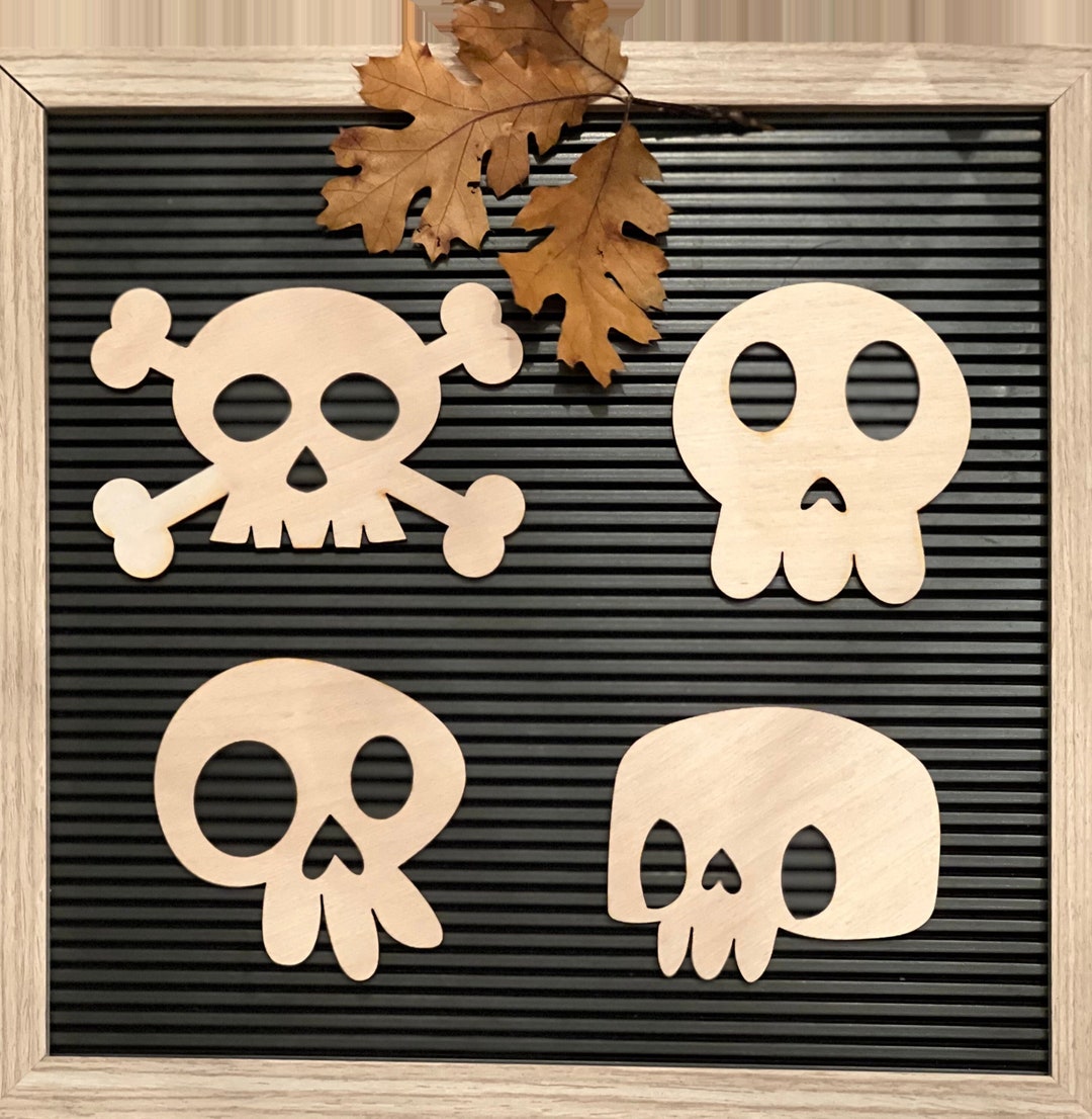 8. Phantom-atic Punch: Wooden Ghost Cutouts For A Spooky Touch