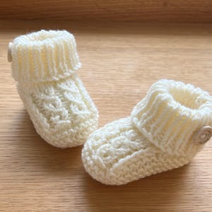 PDF Knitting Pattern Baby Booties With Mock Cable Desgin Easy To Follow Row-By-Row Knitting Pattern Beginner Knitter DK Yarn 0-3 & 3-6 Mths