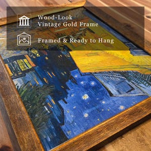 May include: A framed print of a painting featuring a dark blue night sky with yellow stars and a yellow building, enclosed in a wood-look vintage gold frame. The text on the image reads: Wood-Look Vintage Gold Frame and Framed & Ready to Hang.
