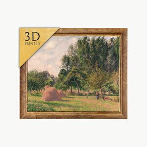 May include: A framed 3D printed artwork depicting a rural scene with hay bales, trees, and a person. The artwork is in a gold-coloured frame. The text "3D PRINTED" is in the upper left corner.
