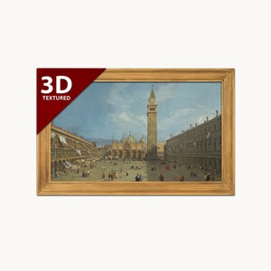 Puede incluir: Un cuadro enmarcado de la Plaza de San Marcos en Venecia, con un alto campanario, edificios con arcos y figuras en una plaza abierta. Una banda roja en la esquina del marco muestra el texto blanco 3D TEXTURED.