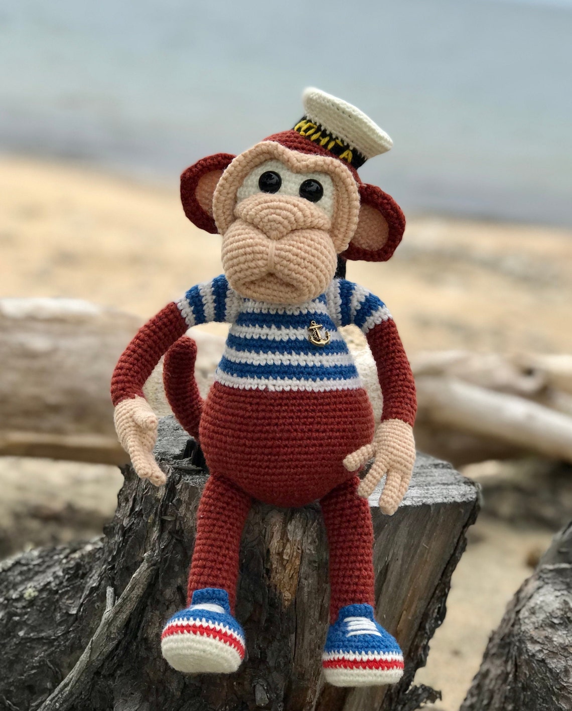 Funny toy monkey. A figurine of a monkey in the shape of a Etsy