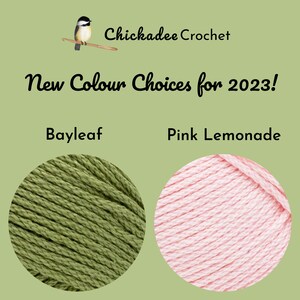 May include: Two skeins of yarn, one green and one pink, with the text "Bayleaf" and "Pink Lemonade" above them. The text "New Colour Choices for 2023!" is at the top of the image.
