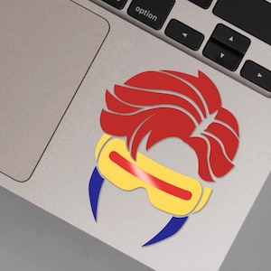 May include: A red, yellow, and blue silhouette of a superhero with a red mohawk hairstyle and a yellow visor.