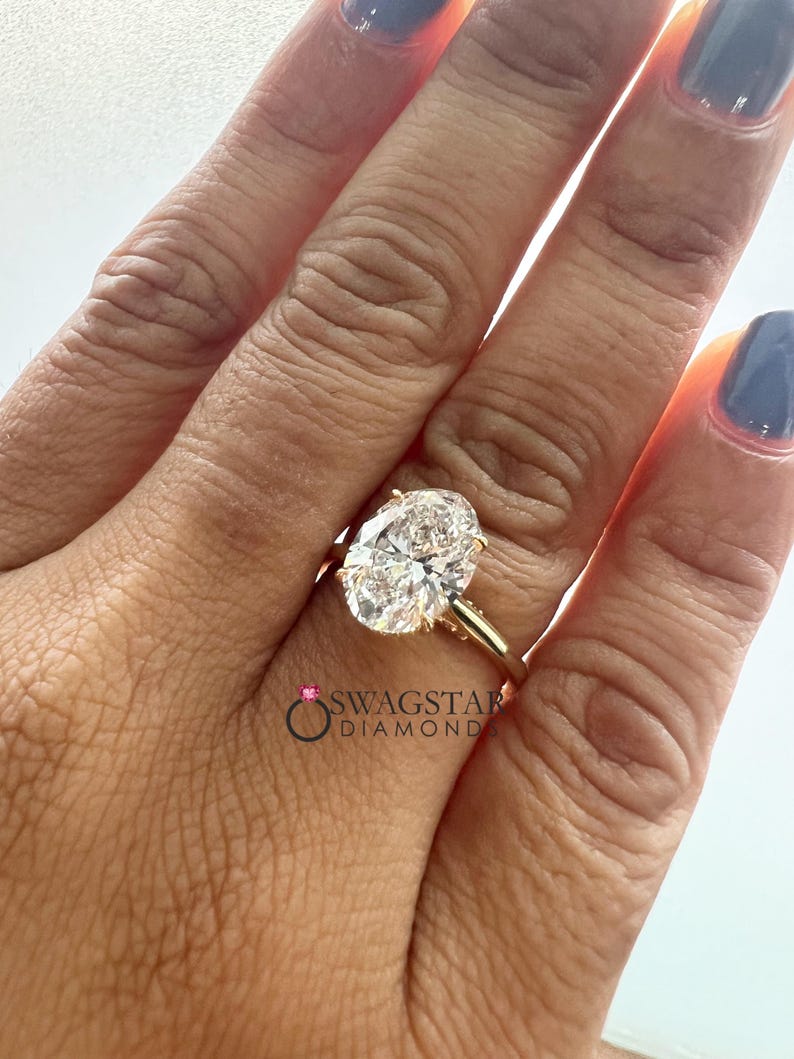 hidden halo oval cut lab grown diamond ring