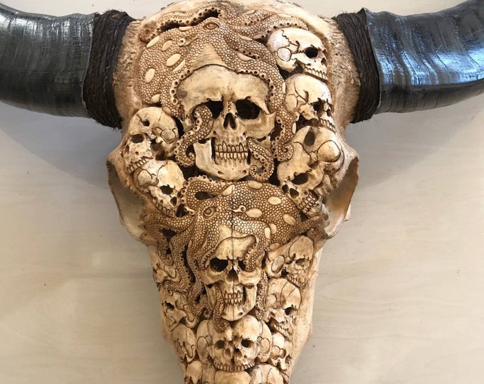 Carved skull buffalo with octopuse lonng horn