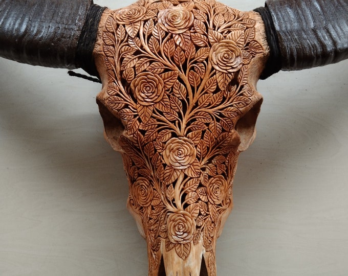carved buffalo skull Rose antic