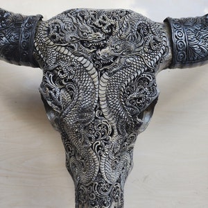 carved buffalo skull dragon with carved horn