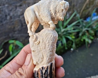 Deer antler carving for knife or cane handle bison