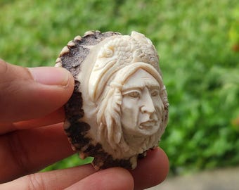 Hand-Carved Tribal Face Pendant – Natural Antler/Bone Art