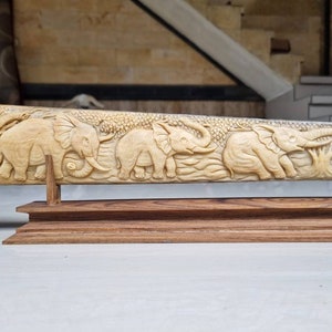 bone carving swordfish nose elephant groupe