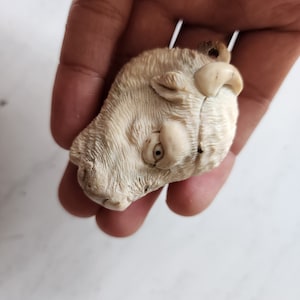 Antler carving niecklase bison head