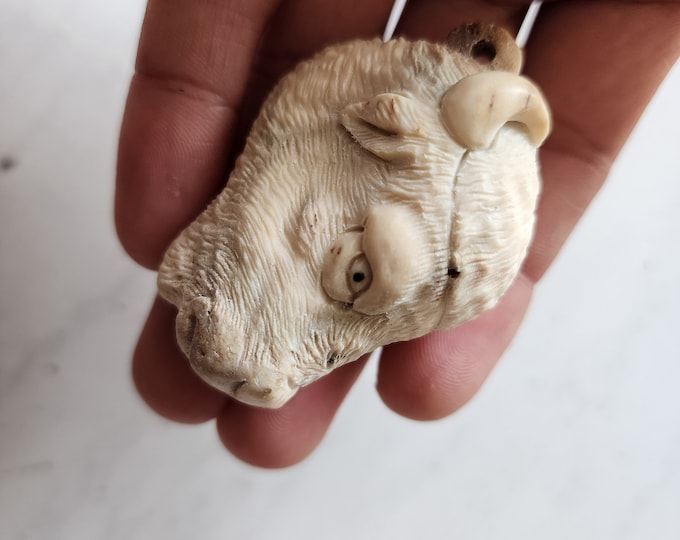 Antler carving niecklase bison head