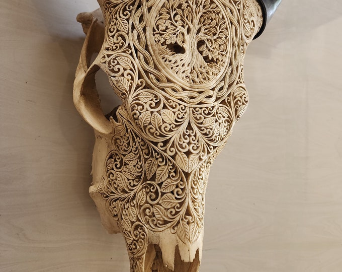 carve cow skull tree of live brown