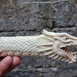 Knife handle antler carving dragon