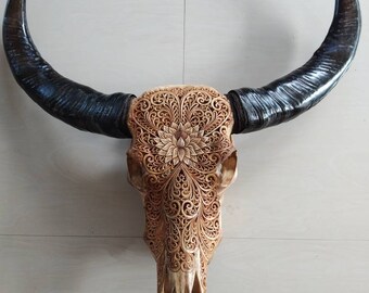 carved buffalo skull carving Lotus padma