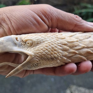 Deer antler carving for knife handle eagle