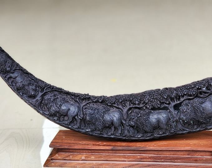 carve buffalo horn bison walking in jungle